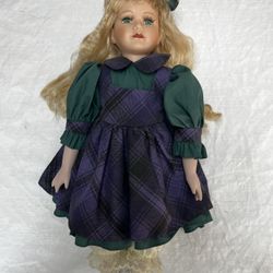 Vintage Porcelain Doll With Green Eyes And Purple Plaid Dress