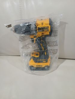 DEWALT  XR BRUSHLESS HAMMERDRILL  WITH 5.0 BATTERY BRAND NEW.  $160
