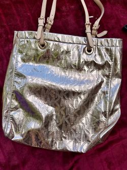Gold and red MK tote bags