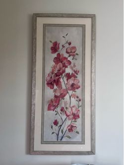 Two piece set of framed multi floral wall art