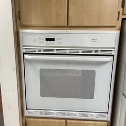 Frigidaire Oven and Koehler Stainless Steel Double Sink