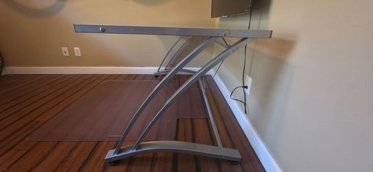 Glass desk, bookshelf and chair pad