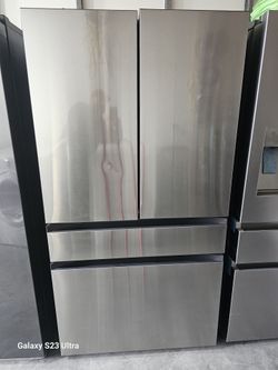 REFRIGERATOR 4 DOOR SAMSUNG STAINLESS STEEL BESPOKE NEW OPEN BOX ONE DENTS IN THE FRONT