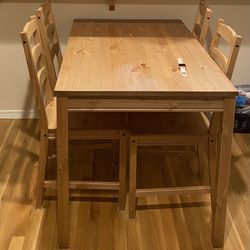IKEA Dining Table With Four Chairs And Four Seat Cushion