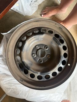 Stock Rims And Hubcaps (4)
