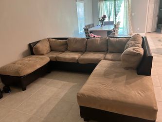 Brown/dark brown black couch with ottoman