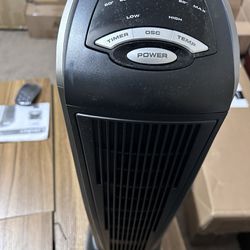 Lasko Oscillating Ceramic Tower Space Heater for Home w/ Thermostat, Timer and Remote 751320 Silver
