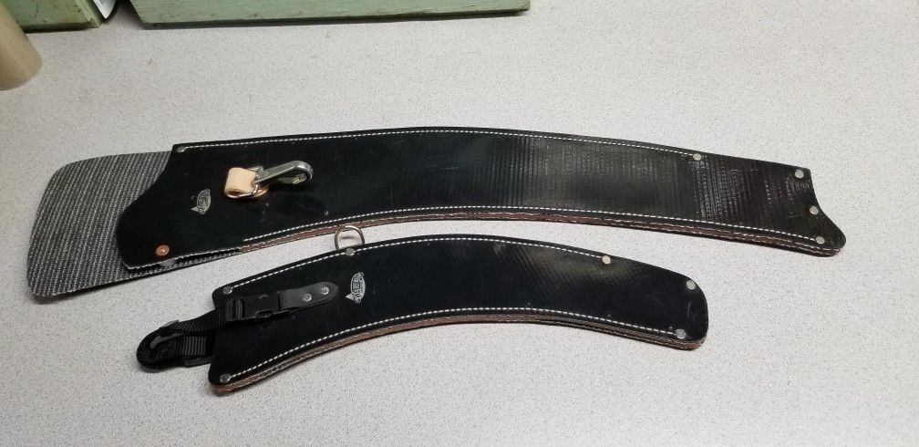(2) NEW WEAVER SAW SCABBARDS $40