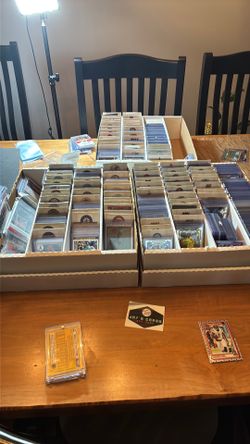 HUNDREDS OF SORTED SPORTS CARDS