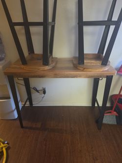 Small wooden table with 2 chairs