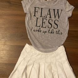 WOMEN’S TENNIS SKIRT AND BACK OUT SHIRT.