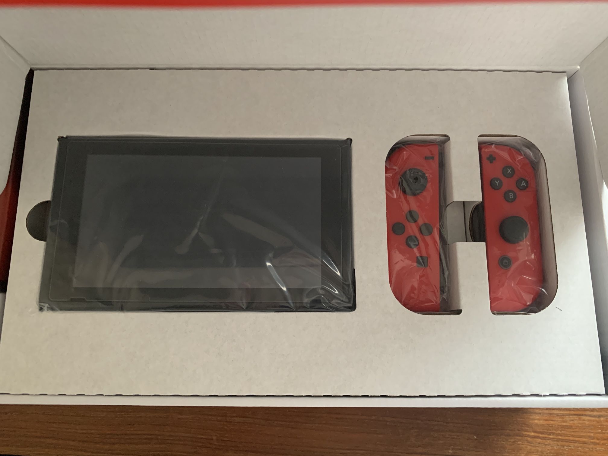 Nintendo Switch V2 with Mario Red Joy-Cons