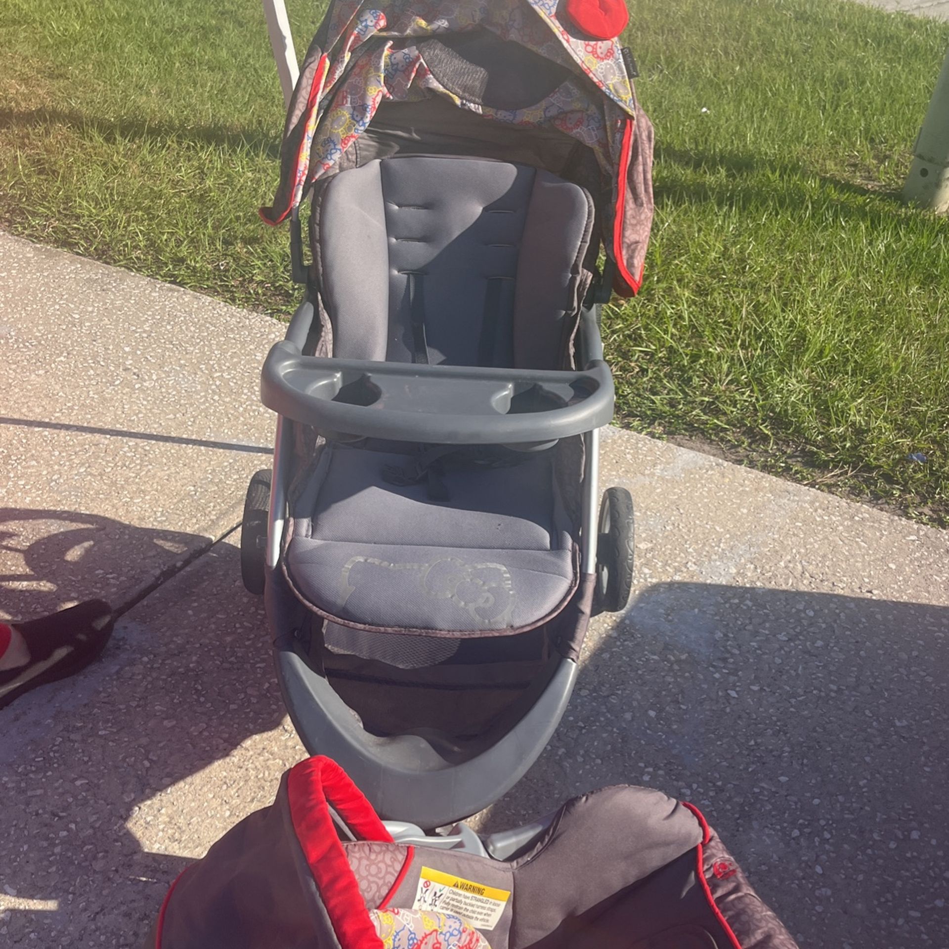 Hello Kitty Stroller With Car seat