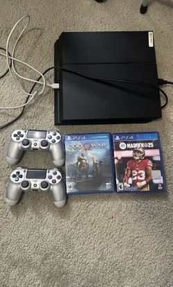 PS4 With Controllers And 2 Games