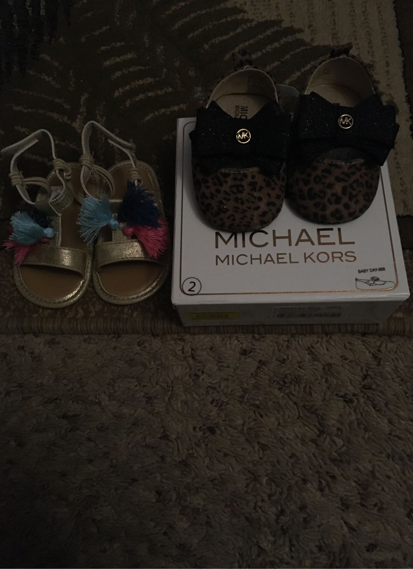 1 Michael kors shoes and 1 sandal