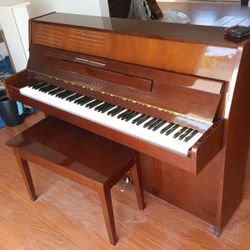 Kawai Upright Piano w/ Bench – $900 (Great Condition) 