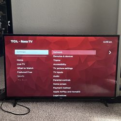 43” Roku Tv  & Ps5 Remote . 