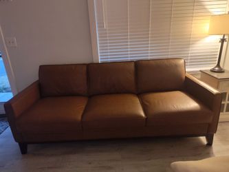 Leather sofa and ottoman new $3,000
