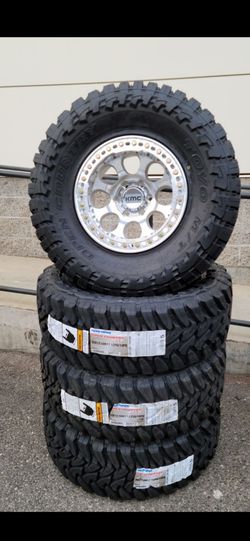 17" KMC beadlocks w- 35" Toyo MT tires