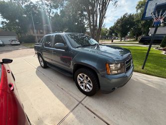 Chevrolet Avalanche LTZ on 20 inch stock wheels
