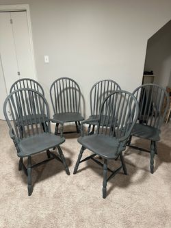 Solid wood 60 x 40” farmhouse table with six Windsor chairs and 18 inch extension leaf