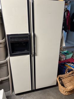 GE Side-by-Side Refrigerator with Ice Dispenser