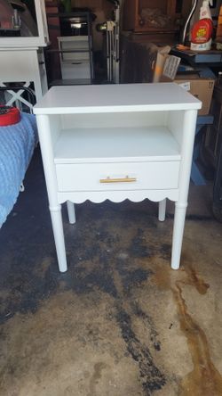 Scalloped edge nightstand