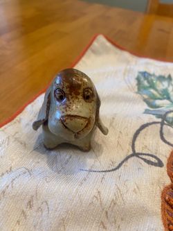 Small vintage studio pottery signed with artist symbol on bottom , dog statue. 3 x 2 inch.