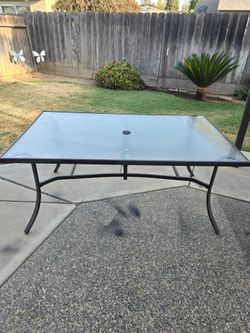 Glass top patio table