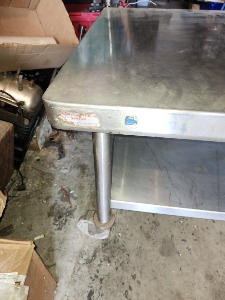 STAINLESS TABLE ON WHEELS 30X30X 24IN HIGH NSF STICKER