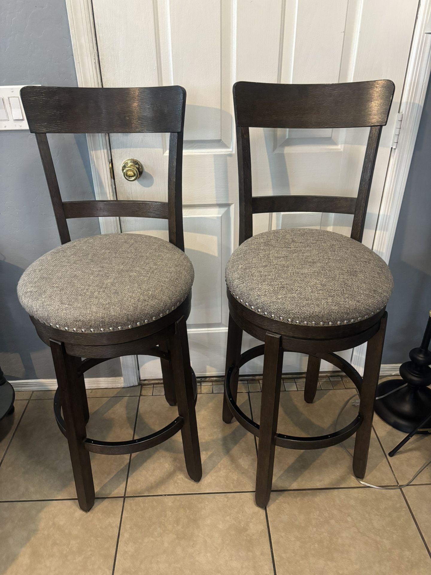 2 Beautiful Upholstered Swivel Stools