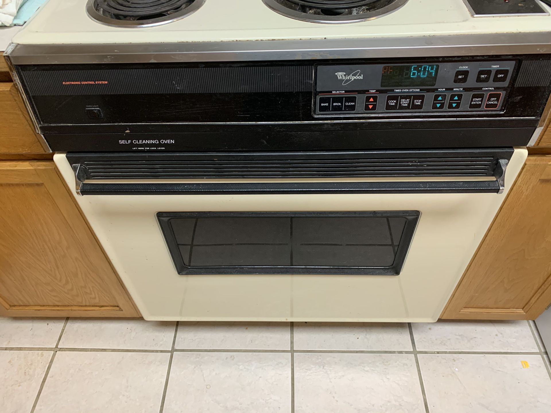 ALL Whirlpool Electric drop in stove, over the stove microwave and dishwasher.
