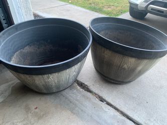 Large plastic barrel pots