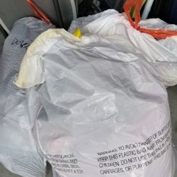 4 Bags Of Women's Clothes Sizes Small, Medium And Large