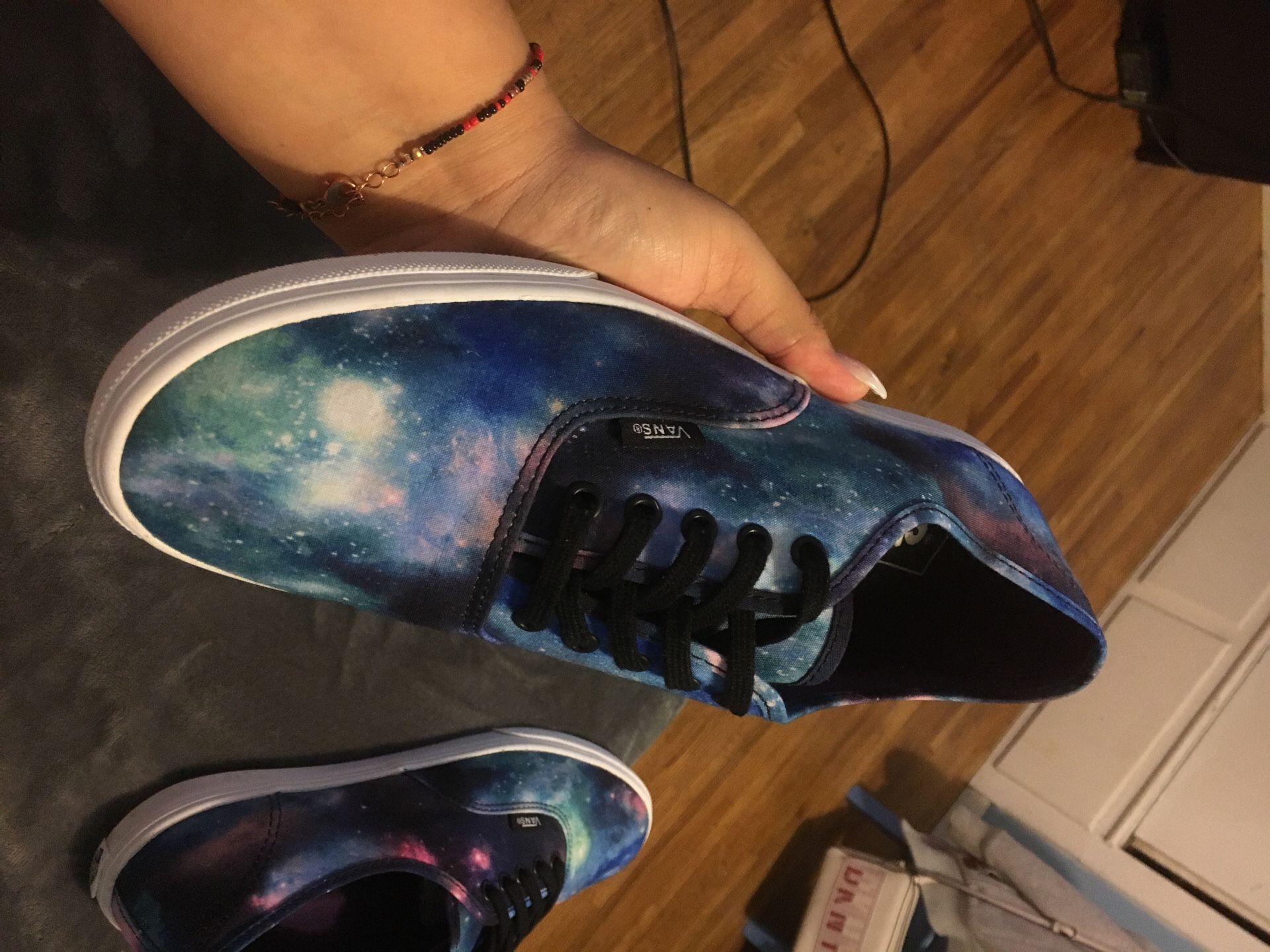 Space model Vans SIZE: 11 in Womens and SIZE: 9.5 in Men’s.