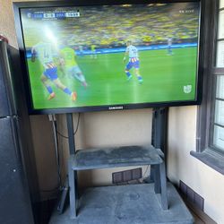 60inch Samsung W/ Tv Stand