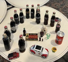 20 +Year Old Miniature Coca-Cola Bottle Collectio& Coca Cola Figurines Collection Notice One Egypt Coca-Cola Bottle & other One Is Japan