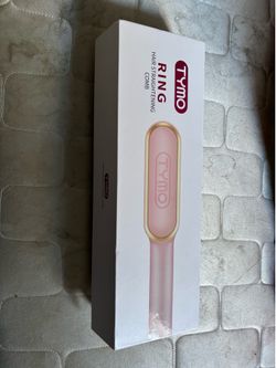 Hair straightening comb