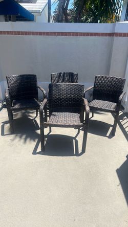 Outdoor dining chairs.  4 wicker dining chairs