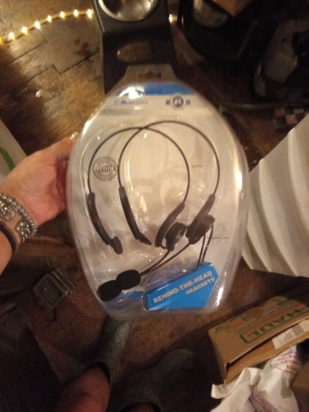 Set Of Behind The Ear Headsets
