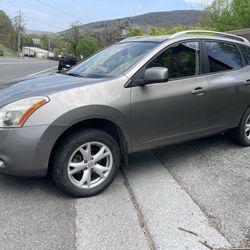 2009 Nissan Rogue - Silver, Reliable, Ready for a New Home!