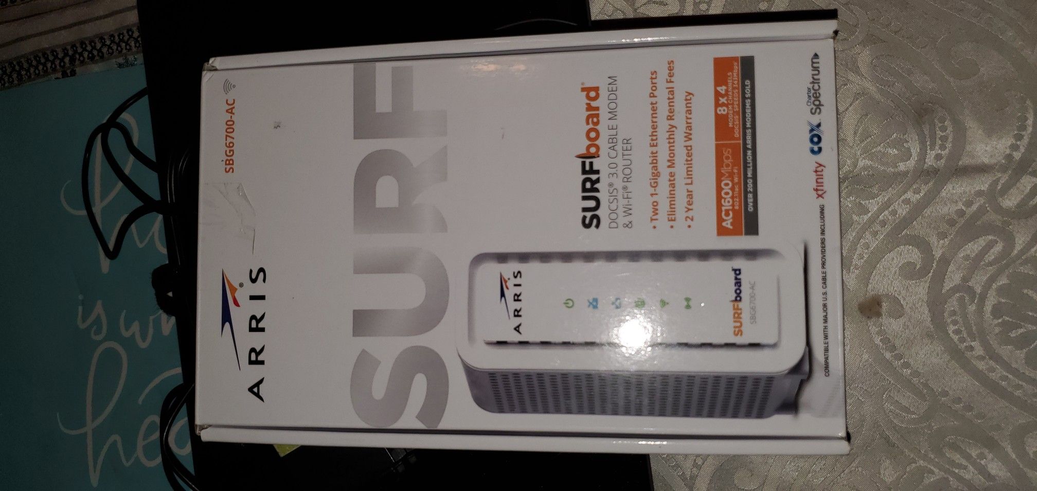 Arris internet modem. Works with Xfinity and Cox internet.