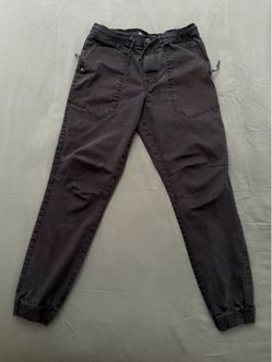 Black relaxed cuffed Jogger Pants with Zip Pockets