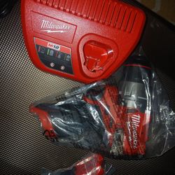 Milwaukee M12  Impact  Drill Charger And  Battery 
