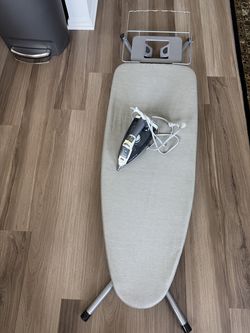 Clothing iron and table