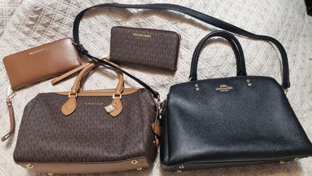 Michael Kors purse with two matching bill folds,wallets and a Coach purse 