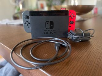 Nintendo Switch 1 used-good quality with TV dock, charger & HDMI port