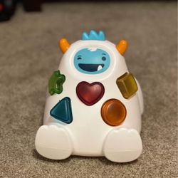 Skip Hop Explore & More Shape Sort & Spin Yeti Toy