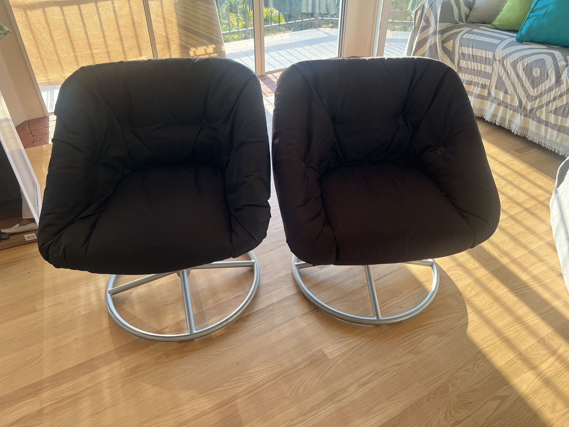 Two Swivel Chairs