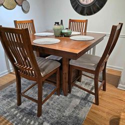 Solid Wood Table, 4 Upholstered Chairs, Leaf, And Storage 